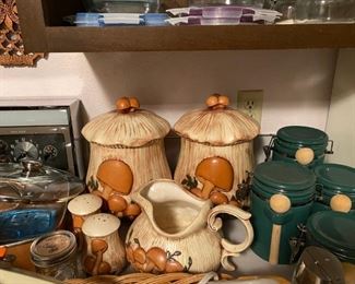 Vintage painted canisters and vintage green canisters