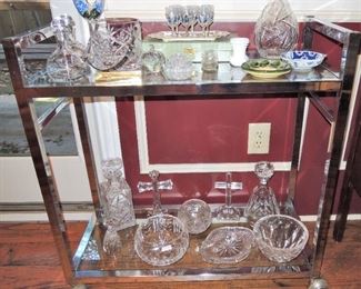Chrome bar cart with crystal. Baccarat Tallyrand Decaner, Waterford bowls and crosses, Kosta Boda bowl, heavy etched and cut glass