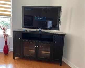 42 inch television and entertainment center