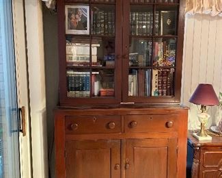 Antique Perfect Condition Cabinet/Bookcase 8 feet tall $950 Available for Pre Sale.                                                                  Call Donna at 850-516-2425