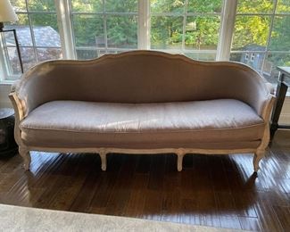 Limed Oak Settee upholstered in neutral linen. Classic Louis XV style with gently scalloped back arms and legs have subtle carvings. Measures 86" W x 30" D. Photo 1 of 3. 