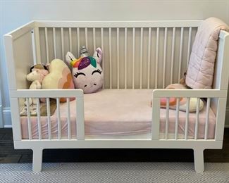 Crib. Measures 54" W x 30" D.