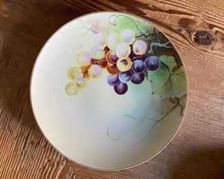 Hand-painted porcelain plate. Photo 1 of 2. 