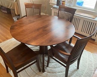 Dining table by Nichols and Stone, Mfg. 4 chairs, 2 leaves -- Provincetown pattern solid birch/maple