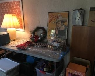 Framed western poster, lamp, decor