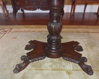 Carving on pedestal and feet