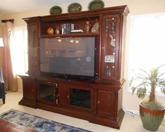 Holds up to 60" TV.  Interior Lighting.  Lots of Storage