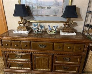 Wood Dresser, bird figurines, and lion lamps