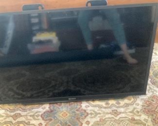 Wall Mount on back of TV is included, 27 inch great Sony picture