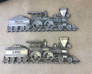 Wall plaques of train engine in silver or gold to match your wife’s decor😂