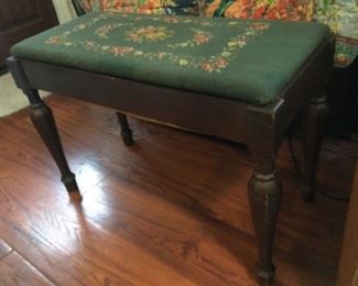 Bench seat opens, easy recover if you are not fond of needlepoint, but nice work if you are