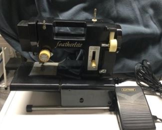 Featherlite sewing machine nice small size for travel, quilters friend