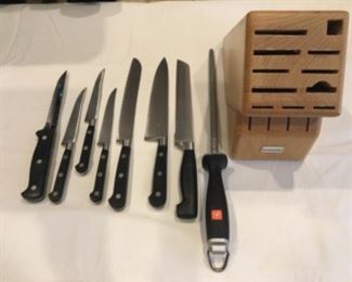 Not full set but great wustof knife rack with sharpener