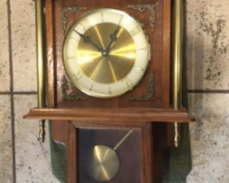 Wall clock including pendulum