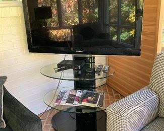 FLATSCREEN TV AND CONTEMPORARY STAND