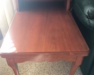 one of two cherry side tables