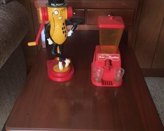 Vintage Mr. peanut and Soda fountain on two of two cherry side tables