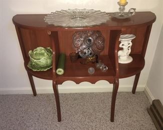 2 of 2 small cherry side tables with assortment of glassware