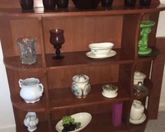 cherry display case with assortment of glassware 
