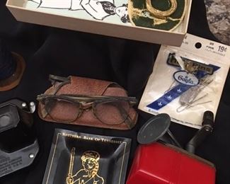 ladies fashion clip, old glasses, hat pins, northern bank ash tray and pencil sharpener