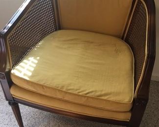 mid century chair with side cane on chair 