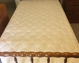 one of two maple twin beds that are a pair in excellent condition
