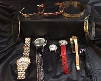 various collection of watches and braclets