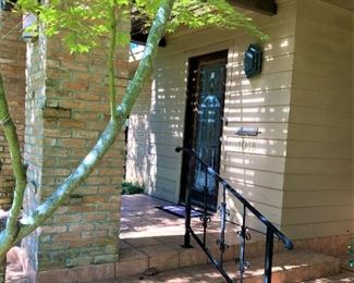 Please enter through the front door.