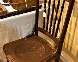 Antique wood and leather chair