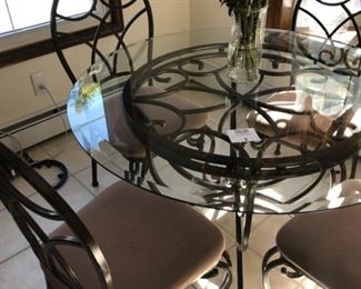Wrought Iron dining room table with chairs