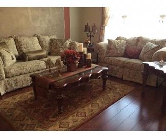 This picture shows the complete room of the items for sale.
Sofa & Love seat, $800.00
3pc Wood table set $800.00
(2 end Tables & coffee table)
2 pairs of lamps - $60.00
A beautiful area rug! 
Rug measures 5’x71/2’