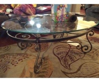 3pc set … 
Oval Glass/wrought iron 
 Coffee Table & 2 End Tables 
All 3 for $700.00
(Glass is removable)
Oval table measures : 
L 51”x W34” x H19” 
End Tables are 30” x 24”