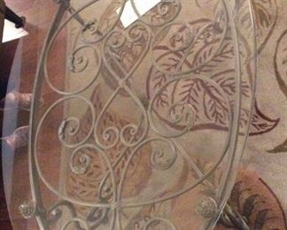 Beautiful Glass Oval 
scroll design wrought iron 
coffee table and 2 end tables . 
