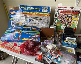 Toy race tracks, and vintage Super Spirograph..