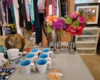 Cups, tiles, chrome vases