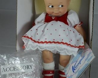 Kewpie doll with accessories 