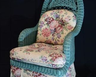 Lynn-Hollyn Wicker Chair with floral cushions