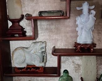 Asian Themed Wall Mounted Display Cabinet With Green And Purple Jade Figurines (SOLD AS ONE LOT/COLLECTION)