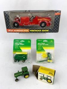 A group of John Deere collectible toys