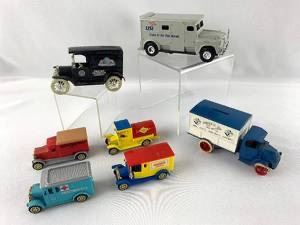 Vintage toy trucks and coin banks
