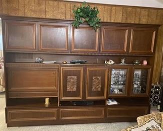 MASSIVE Hutch / Sideboard / Console
Shipped from Germany.
It is currently owned by German immigrants. 
Excellent condition! 
Measures: 112” across x 21” deep x 78” tall
You must be able to disassemble, move and load yourself.
It has drawers, cabinets, a fold down cabinet, glass display case and more. 
Such a one of a kind piece! 