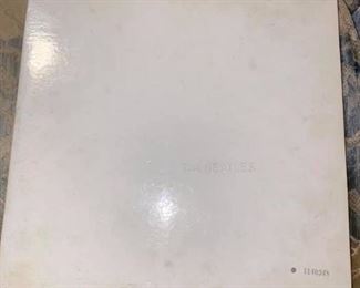 The Beatles White Album 33 Original Records
Album cover is dirty but not ripped or torn.