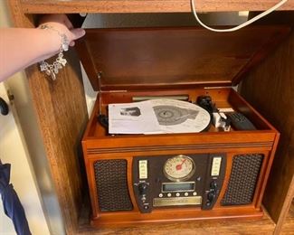 Wooden Music Centre with Recordable CD Player
BRAND NEW!!
Has phonograph, CD player / Recorder, Aux, AM/FM, & Tape