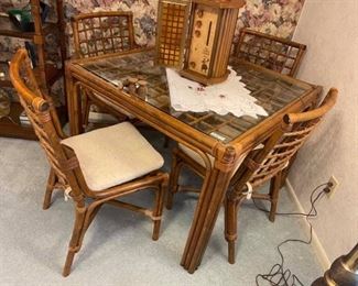 Vintage Cane Table & Chairs with glass top
Excellent condition! 
Table measures: 39” x 39” x 29” tall
Each chair measures: 18” across x 18” deep x 17” tall to seat, 34” tall to back.
Must be able to move and load yourself.