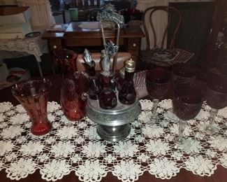 cranberry caster set,  etched cranberry glass