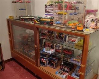 Very nice display case, and yep, more cars.