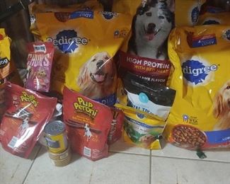 Pedigree dog food, new, unopened bags.