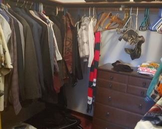 men's suits, dresser, hangers, and don't miss that Energizer Bunny on the shelf