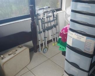 Vintage suitcase, walkers, plastic storage