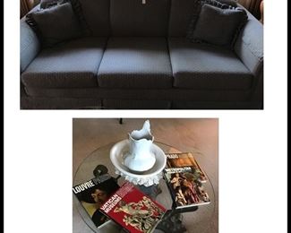 sofa sleeper, round coffee table with glass top